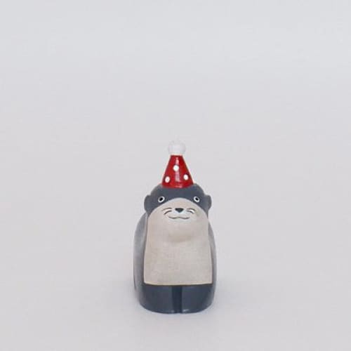 Figurine en bois - Loutre avec chapeau de fête - Image 2